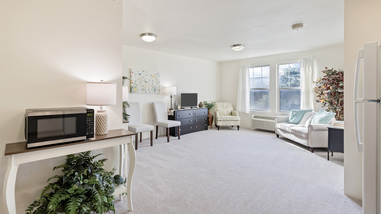 A living room seating area in a Willow Creek apartment