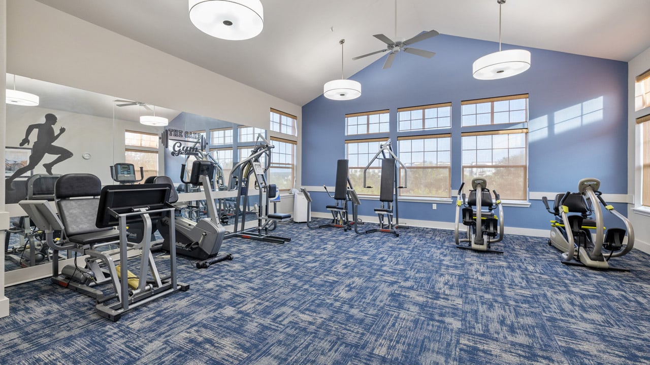 The fitness center at Willow Creek with exercise equipment